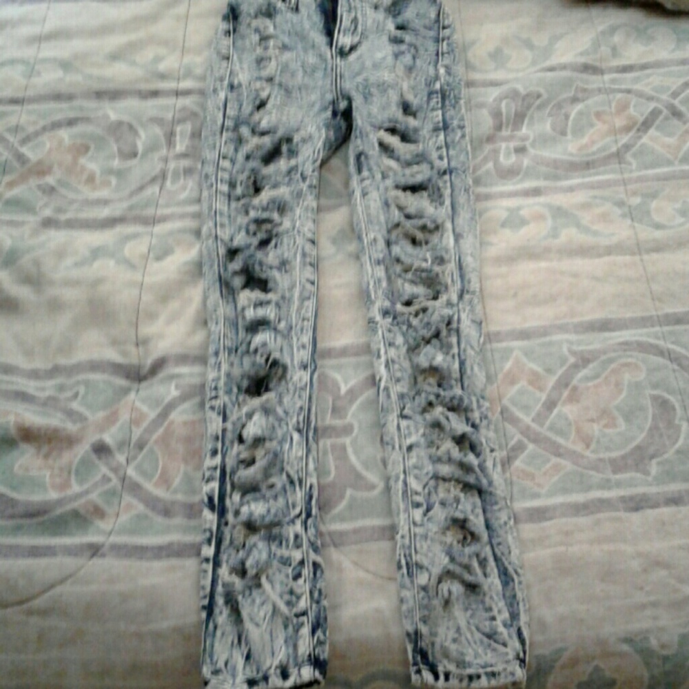 Acid wash distressed jeans